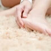 Heel pain, hand on heel