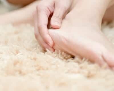 Heel pain, hand on heel