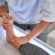 Close up of medical worker massaging foot