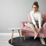 Modern hardworking young female feeling tired after long walk on