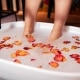 female-feet-put-bucket-pedicure